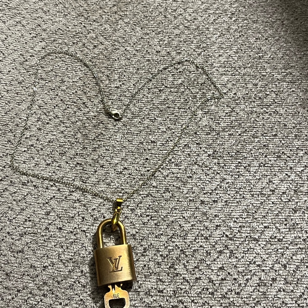 Louis Vuitton lock and key necklace. 18” long. Lock number 319. - Picture 5 of 8